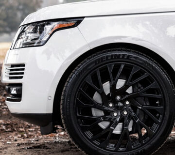 White SUV with black wheels
