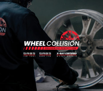 A wheel collision employee reaper/refurbishing a wheel