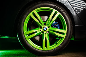 Green colored wheels on a car