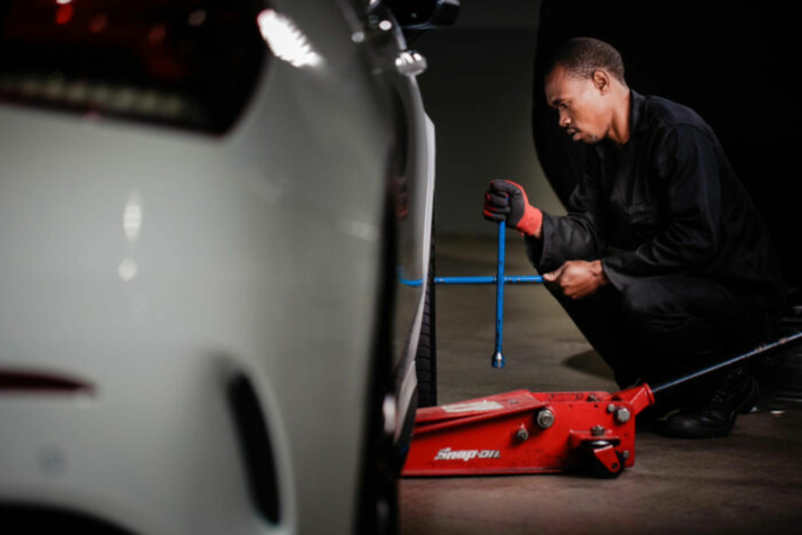 Man repairing a mag wheel on-site